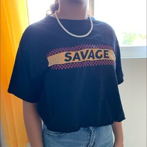 black shirt with/ “savage”
